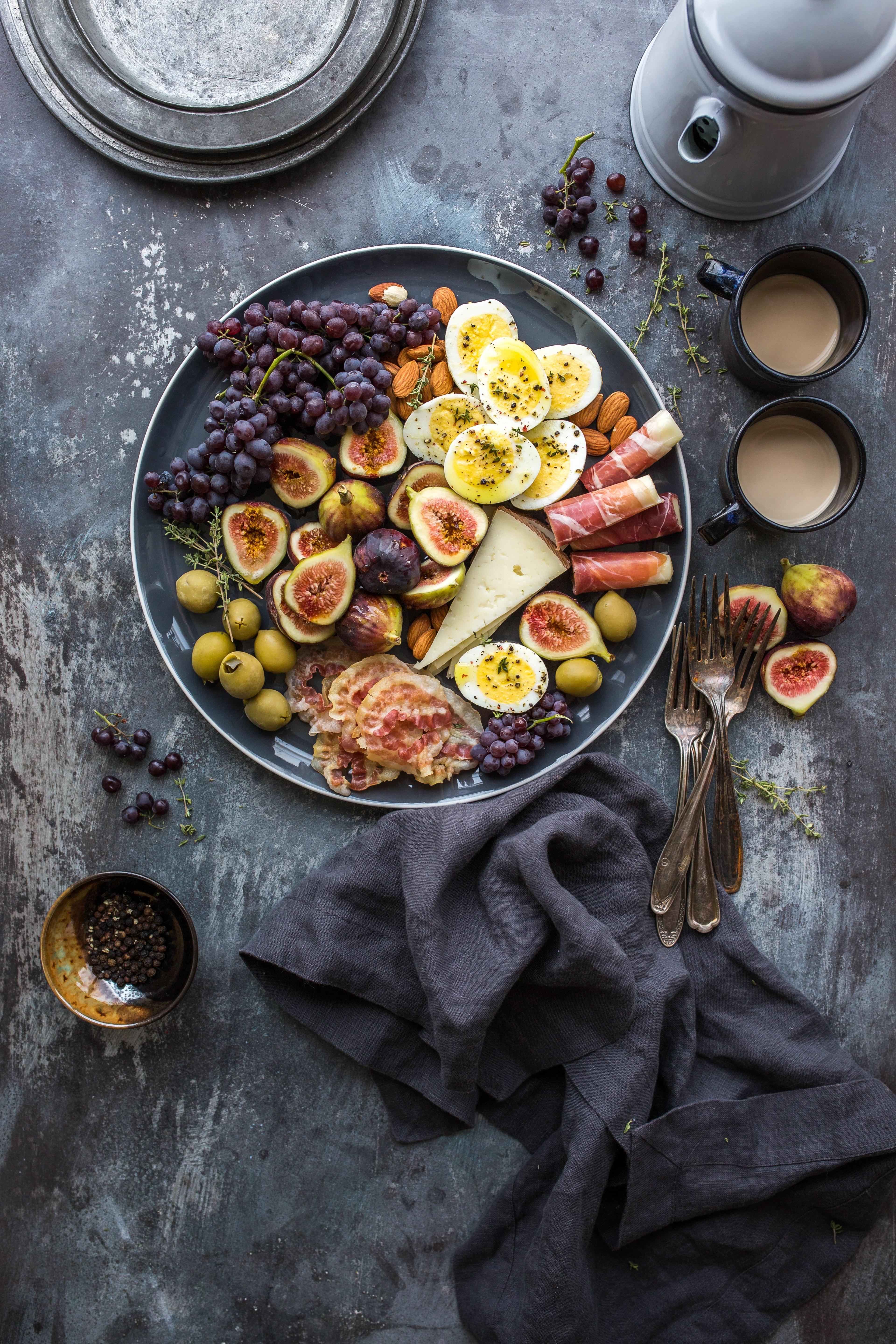 bowl of figs, cheese, ham, boiled eggs