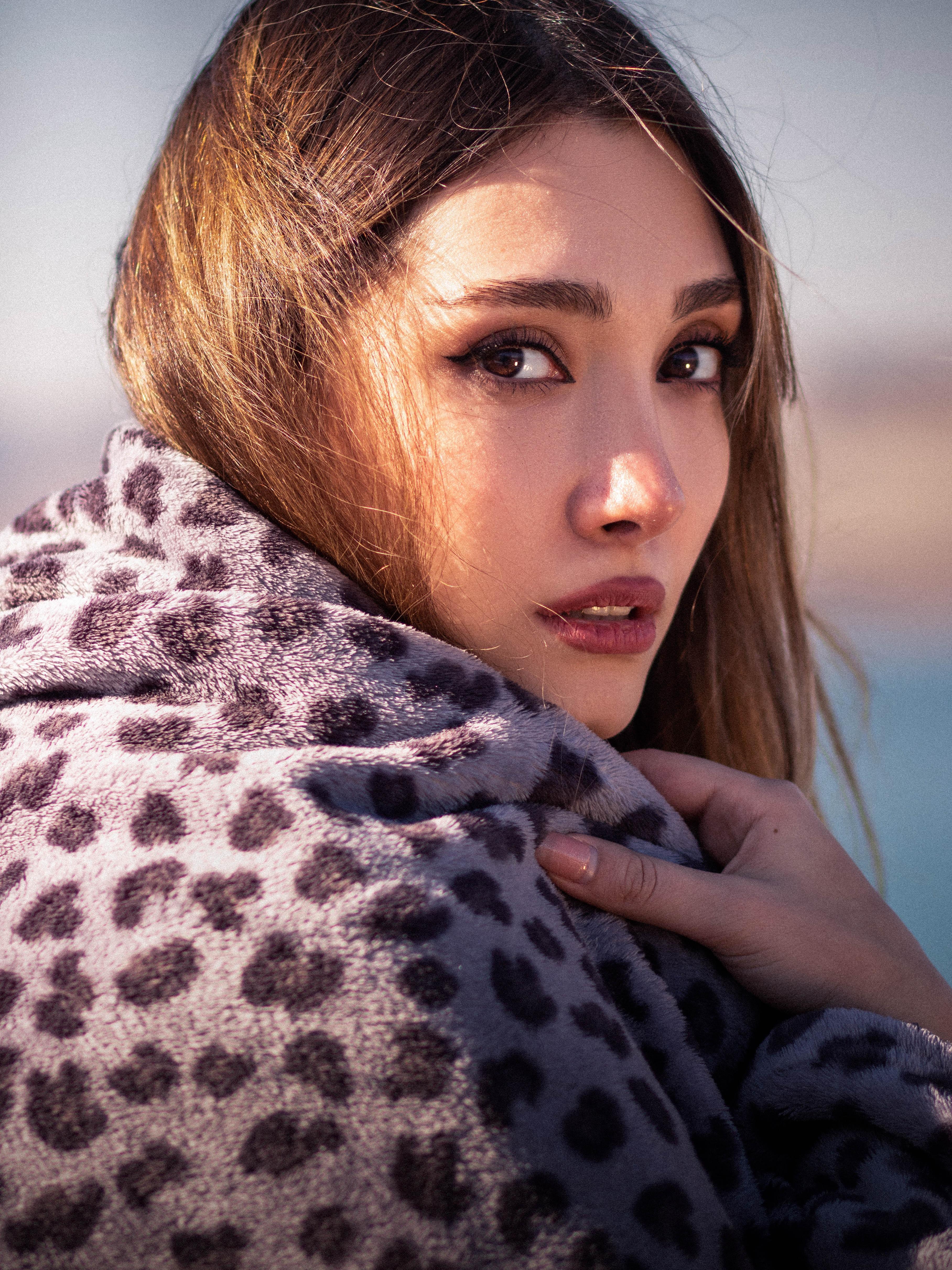 Woman looking back over shoulder