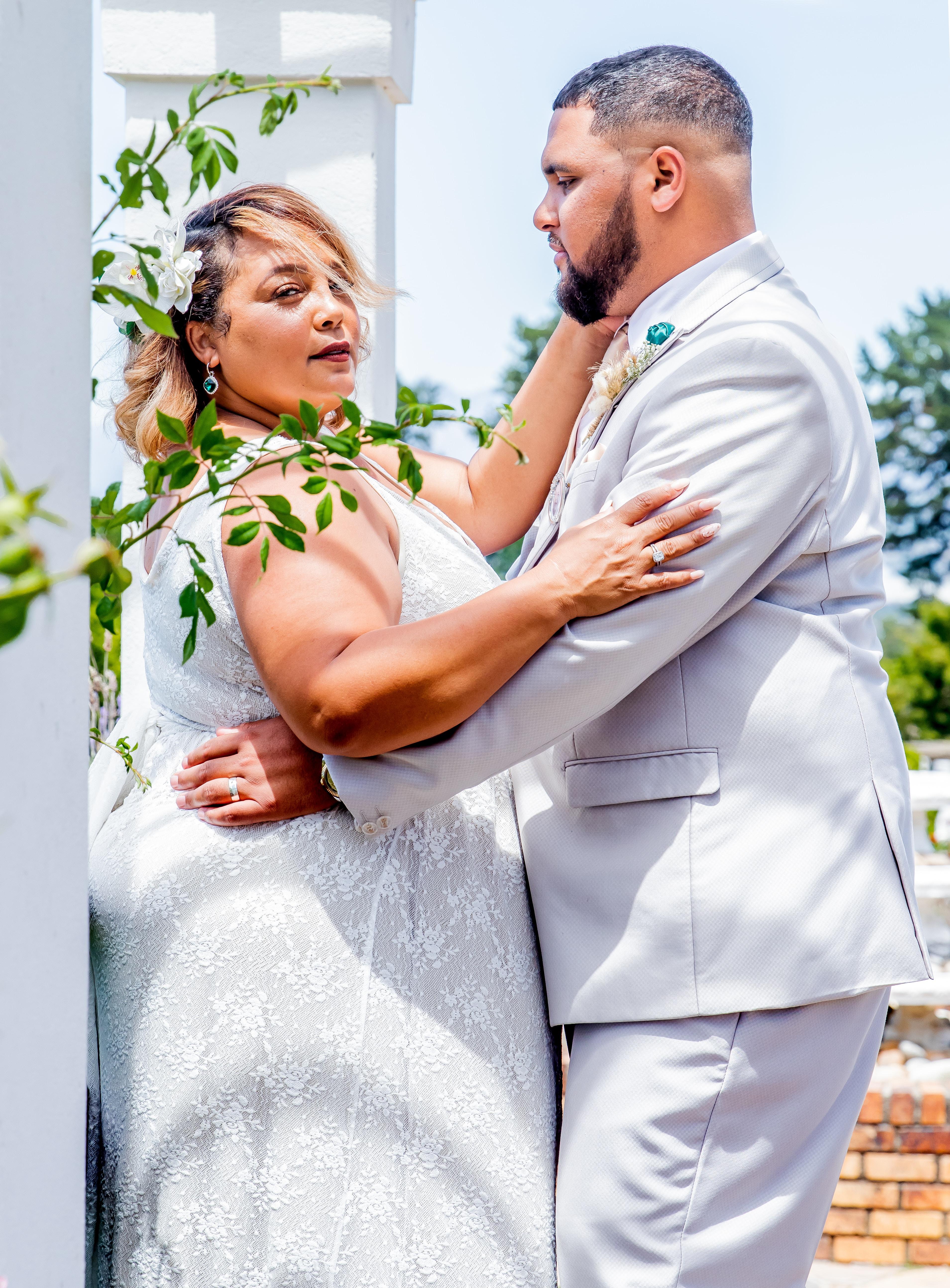 bride and groom holding each other